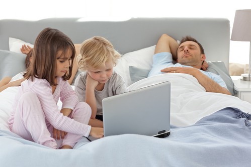 Children in Bed with a Laptop - Latex Hybrid Mattress