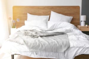 How do you put sheets on a split king adjustable bed