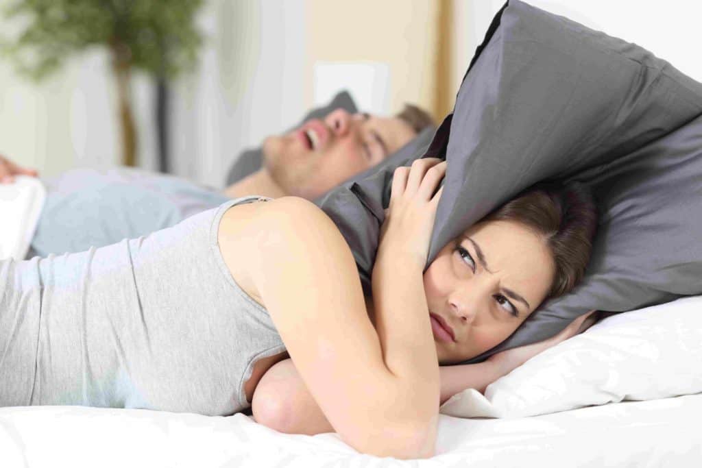How can I sleep with my husband snoring
